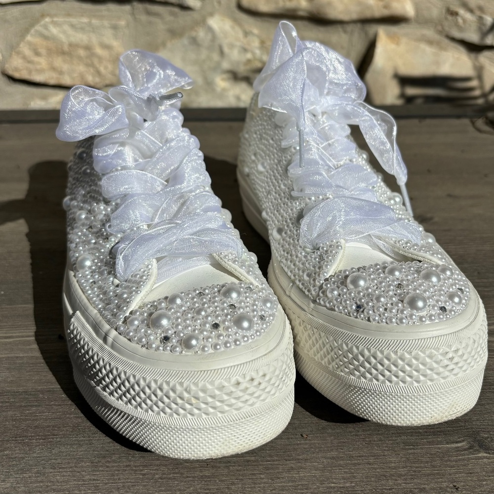 White bedazzled pearl platform converse